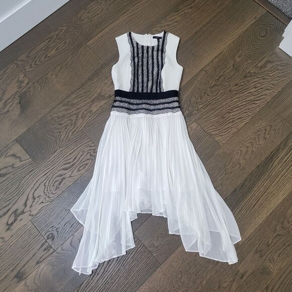 BCBGMAXAZRIA Adelyn Pleated Lace Sleeveless Hi Low Dress in White & Black - Picture 3 of 16